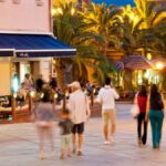 Immagine informativa sulla tassa di soggiorno 2026 e le esenzioni nei vari comuni italiani.